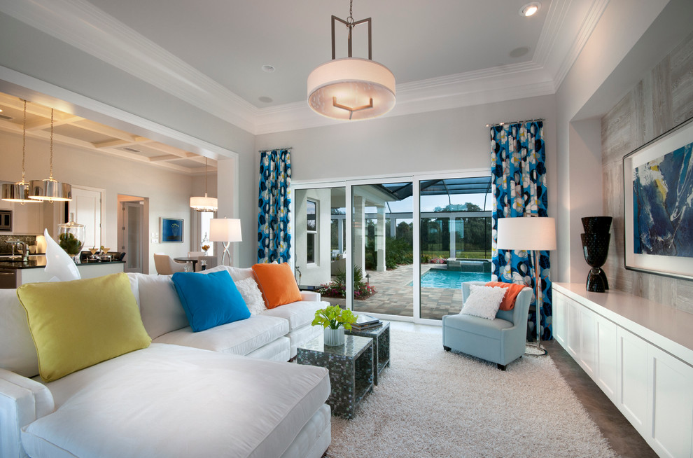 This is an example of a large contemporary living room in Tampa with grey walls.