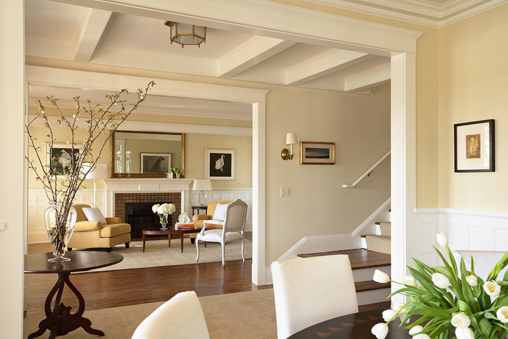 Example of an ornate living room design in Minneapolis with yellow walls
