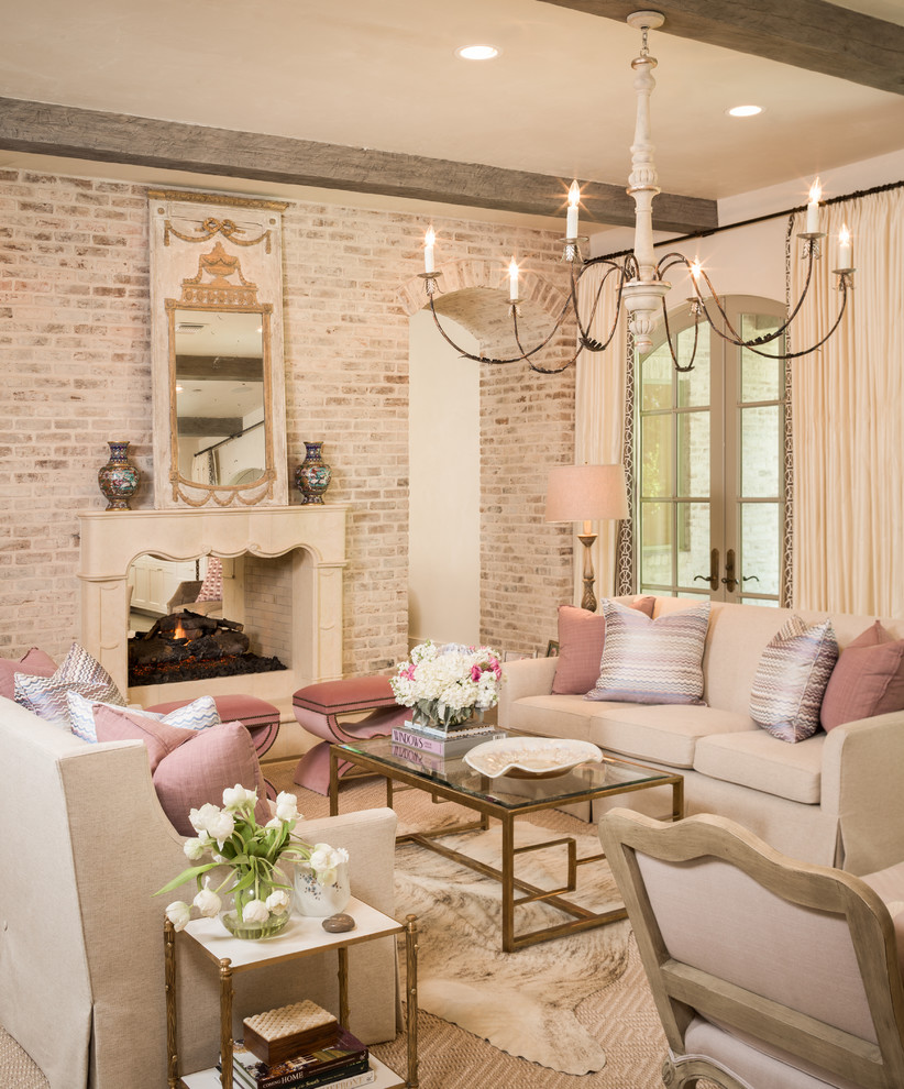 This is an example of a mediterranean formal living room in Dallas with beige walls and a two-sided fireplace.