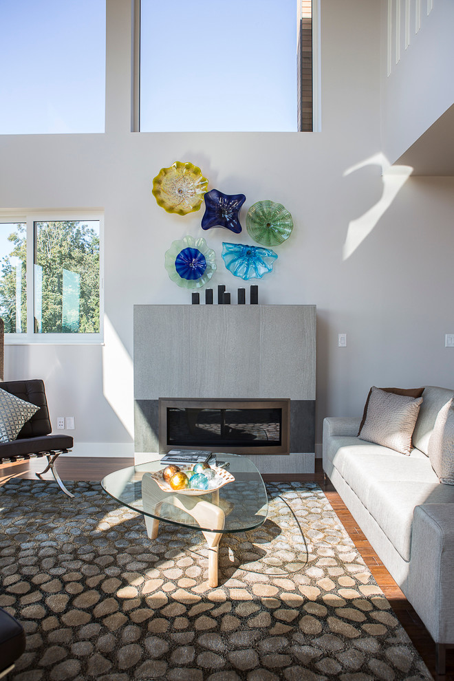 Photo of a contemporary living room in Seattle with a ribbon fireplace.
