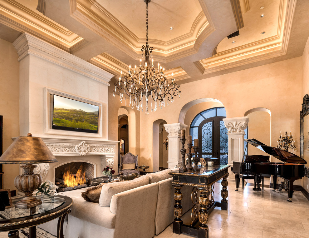Huge mountain style open concept travertine floor and beige floor living room photo in Phoenix with a music area, beige walls, a standard fireplace, a stone fireplace and a wall-mounted tv