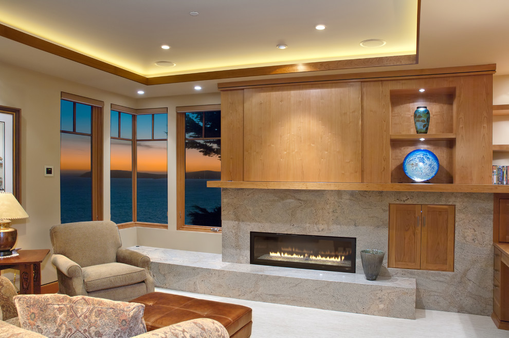 Living room - mid-sized contemporary formal and enclosed porcelain tile and gray floor living room idea in San Francisco with beige walls, a ribbon fireplace, no tv and a stone fireplace