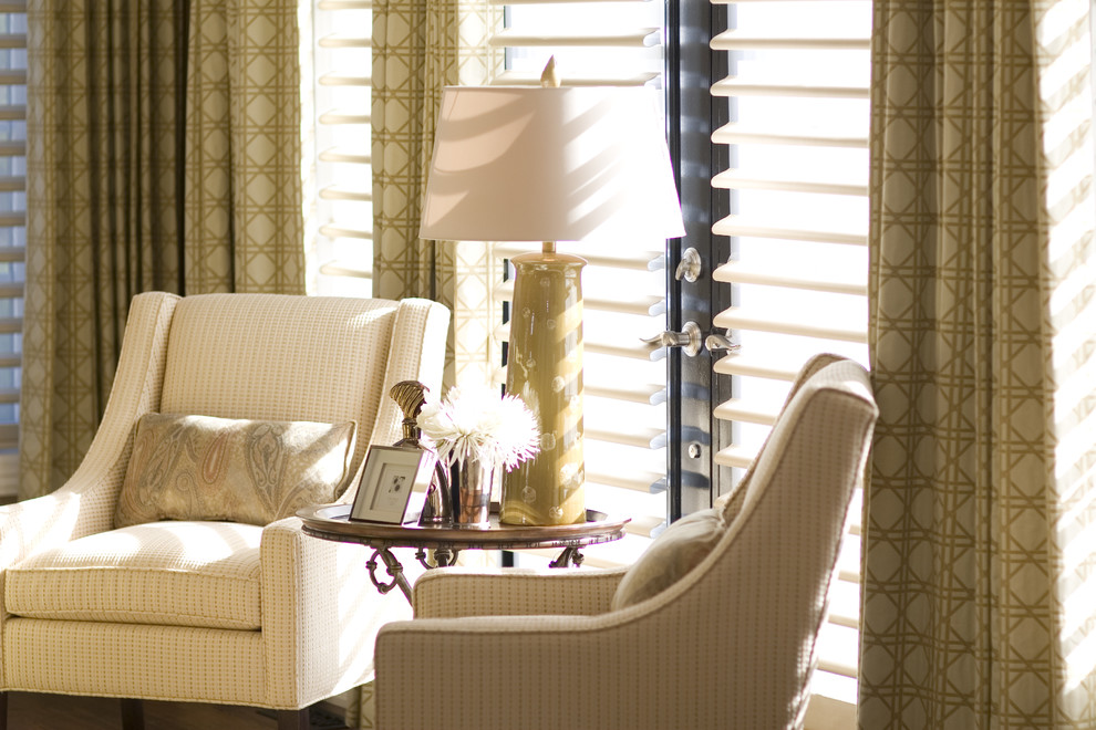 Photo of a medium sized contemporary enclosed living room curtain in Toronto with brown walls, carpet and a built-in media unit.