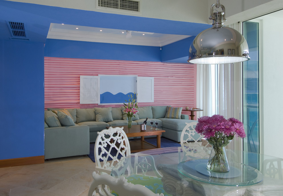 Example of an island style living room design in Other with multicolored walls
