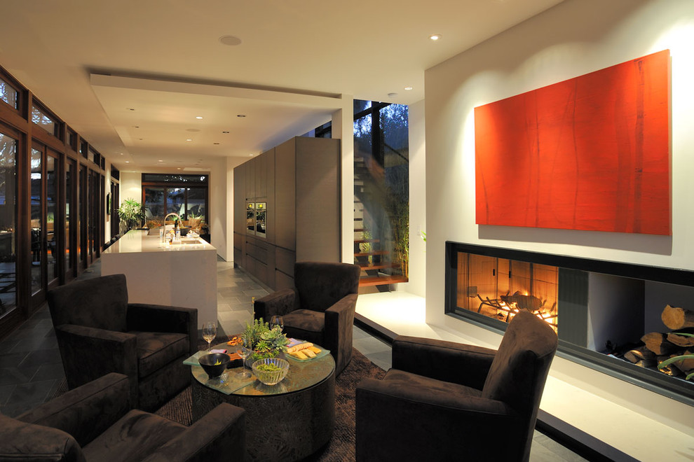 This is an example of a modern living room in San Diego with white walls.