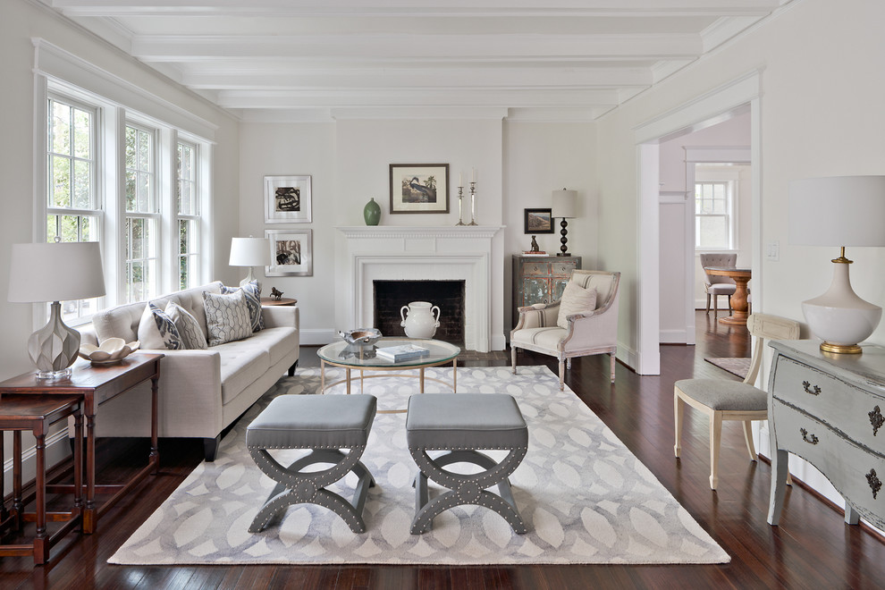 Living room - traditional enclosed dark wood floor living room idea in DC Metro with white walls and a standard fireplace