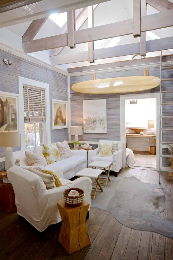 Inspiration for a medium sized coastal open plan living room in Jacksonville with a reading nook, grey walls and medium hardwood flooring.