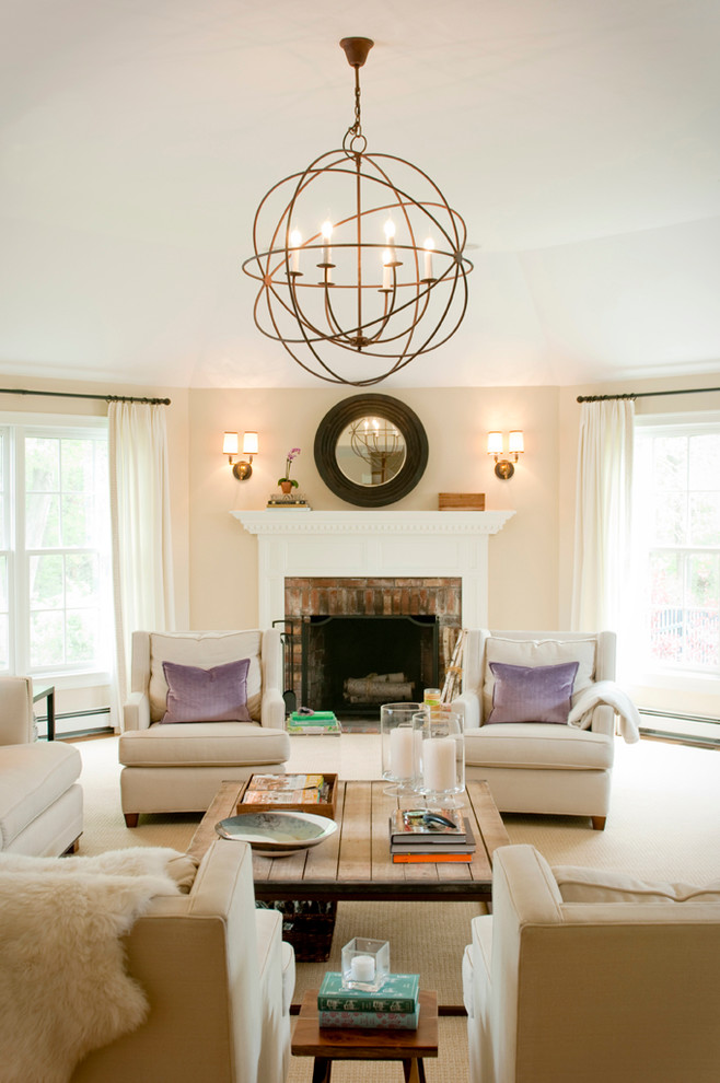 Transitional living room photo in Boston with a brick fireplace