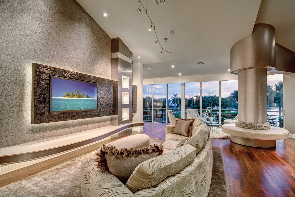 This is an example of an expansive modern living room feature wall in Miami with a wall mounted tv.