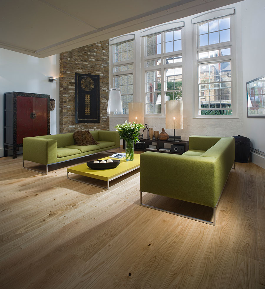 Inspiration for a mid-sized 1950s open concept light wood floor living room remodel in Chicago with white walls