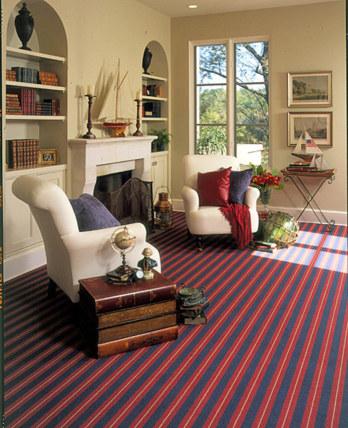 This is an example of a traditional living room in Boston with carpet.