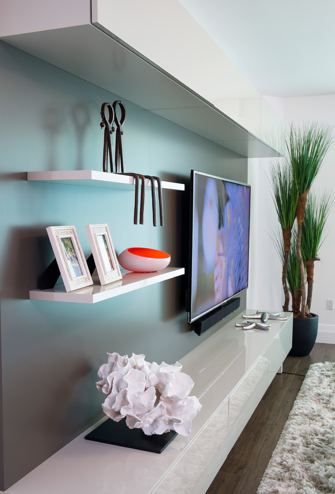 Living room - mid-sized contemporary open concept living room idea in Miami with white walls and a media wall