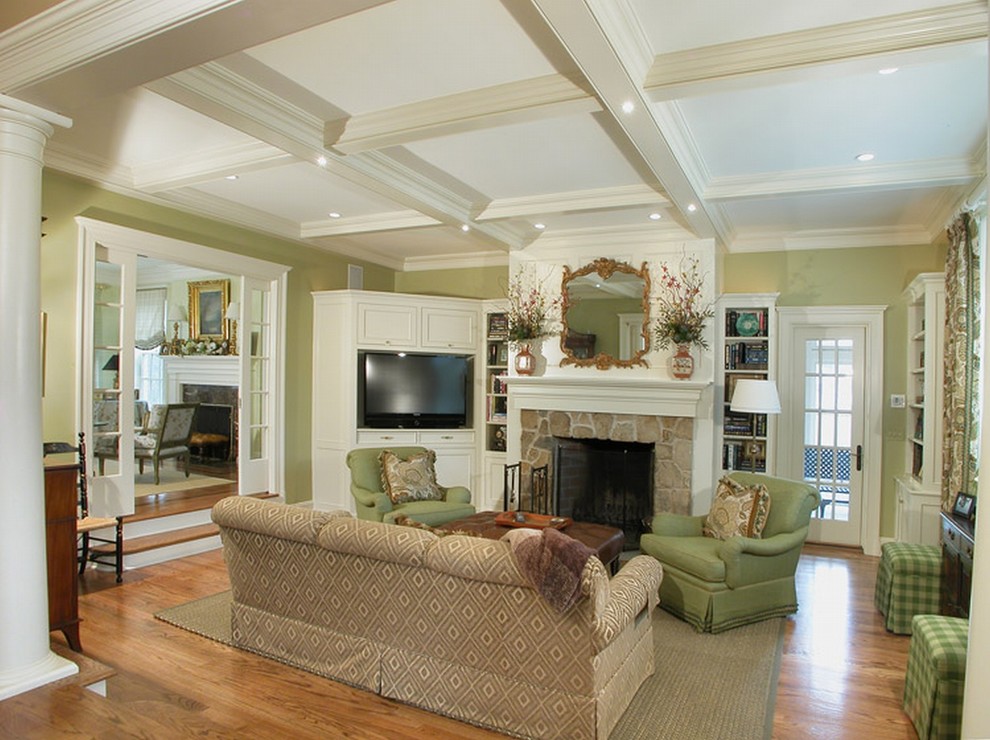 Elegant living room photo in Newark with a stone fireplace