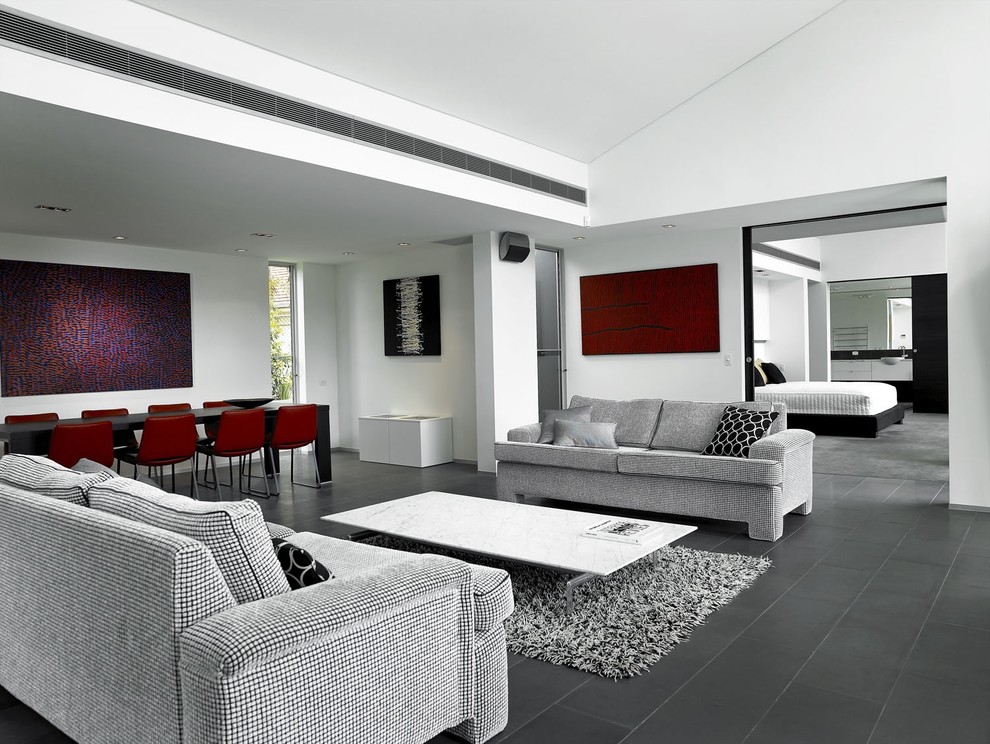 Design ideas for a contemporary open plan living room in Brisbane with white walls.