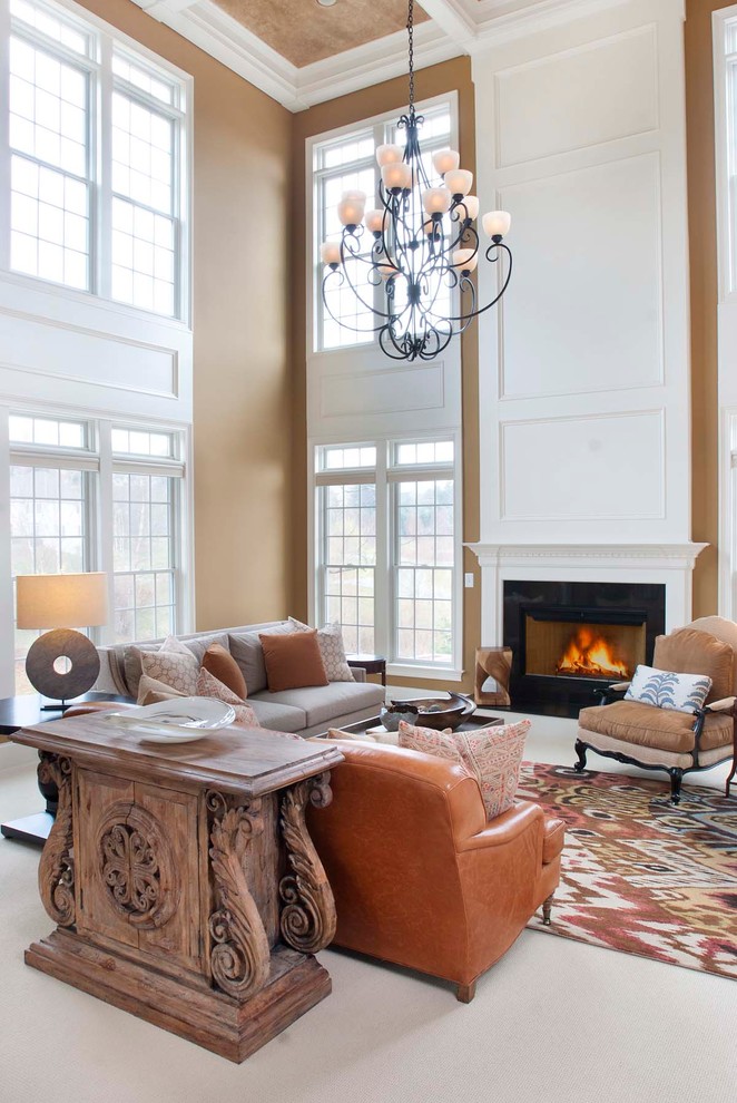 Design ideas for a classic formal living room in Philadelphia with a standard fireplace, a stone fireplace surround, beige floors, a coffered ceiling, panelled walls and feature lighting.
