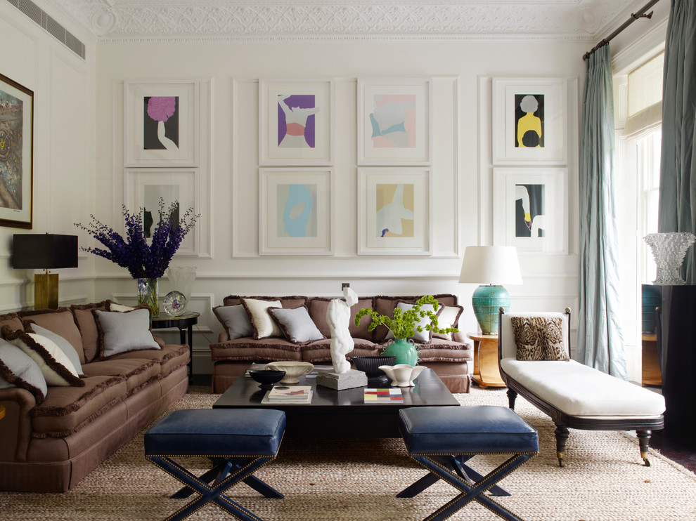 Transitional formal living room photo in London with white walls
