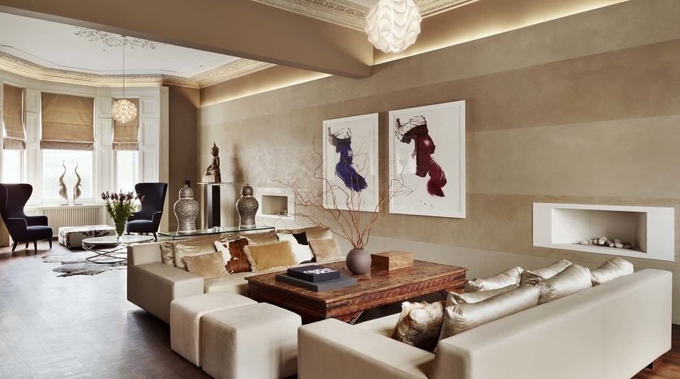 Exemple d'un grand salon chic ouvert avec une salle de réception, un mur beige, un sol en bois brun et une cheminée ribbon.