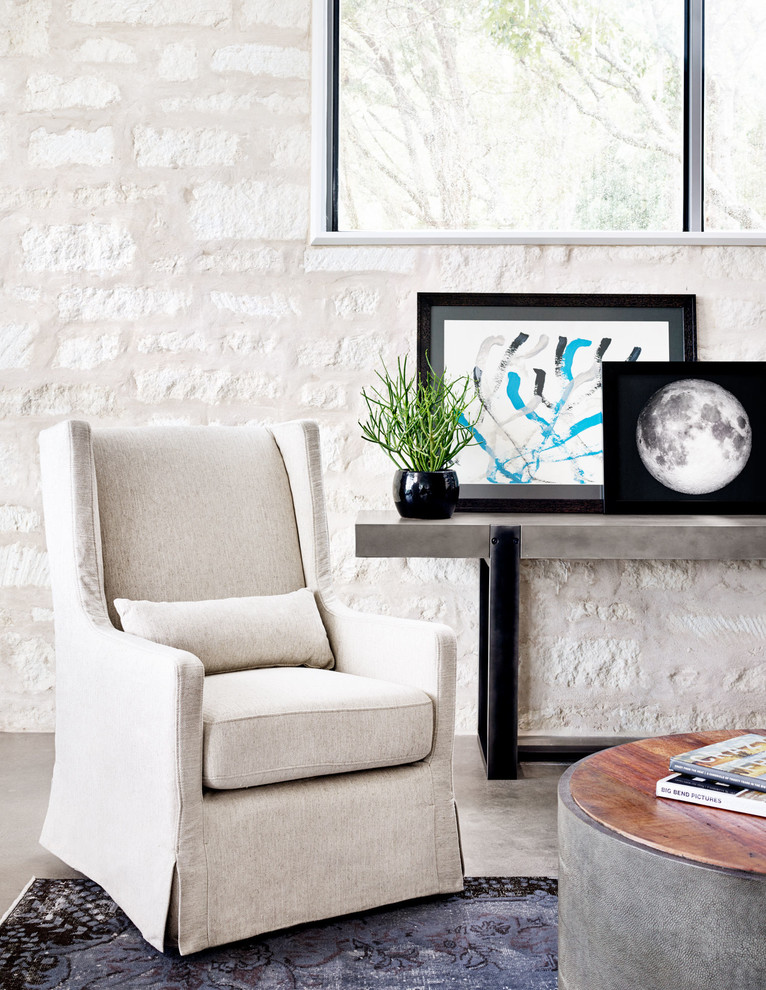 Example of a large eclectic open concept concrete floor living room library design in Charlotte with white walls