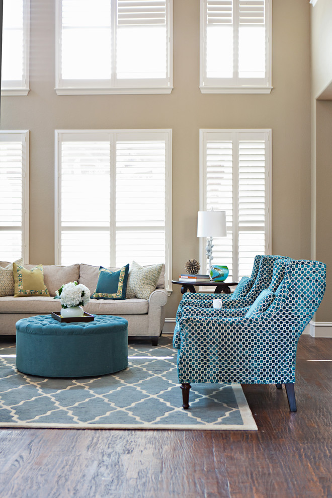 Example of a transitional living room design in Dallas with beige walls