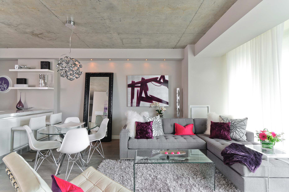 Inspiration for a contemporary open concept living room remodel in Toronto with no fireplace