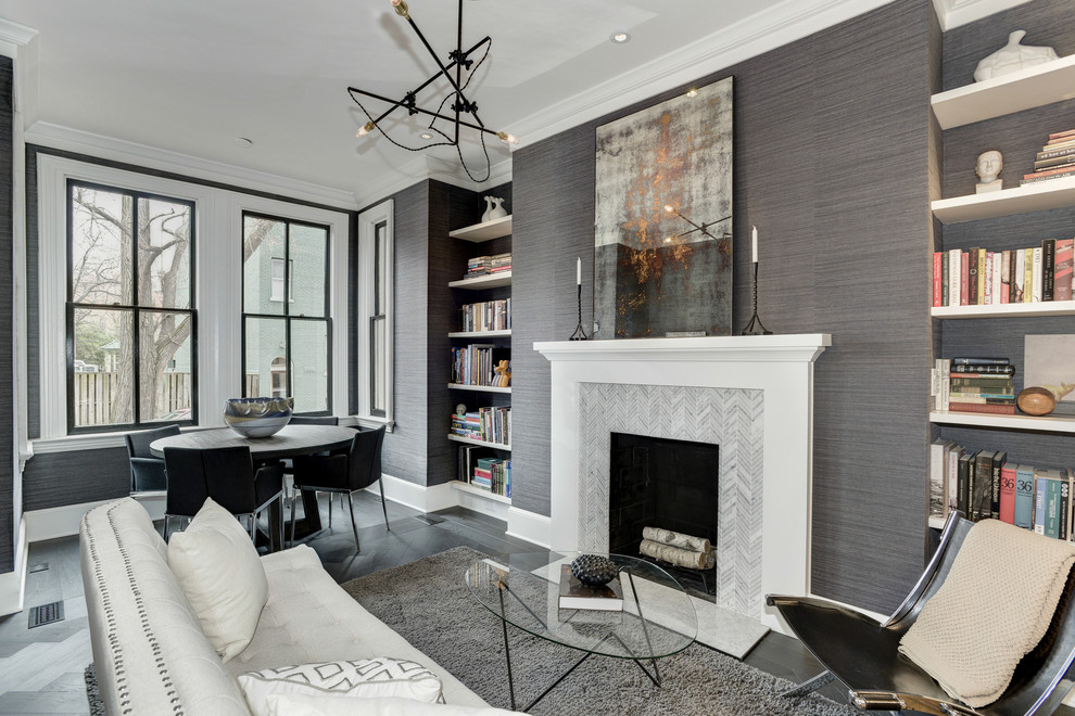 Inspiration for a mid-sized transitional formal and enclosed dark wood floor and black floor living room remodel in DC Metro with gray walls, a standard fireplace, a stone fireplace and no tv