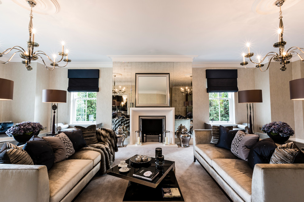 Large contemporary formal living room in Surrey with carpet, a standard fireplace, a metal fireplace surround, no tv and beige walls.