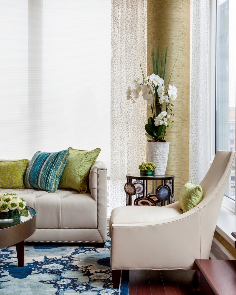 Esempio di un soggiorno design di medie dimensioni e aperto con sala formale, pareti gialle e pavimento in gres porcellanato