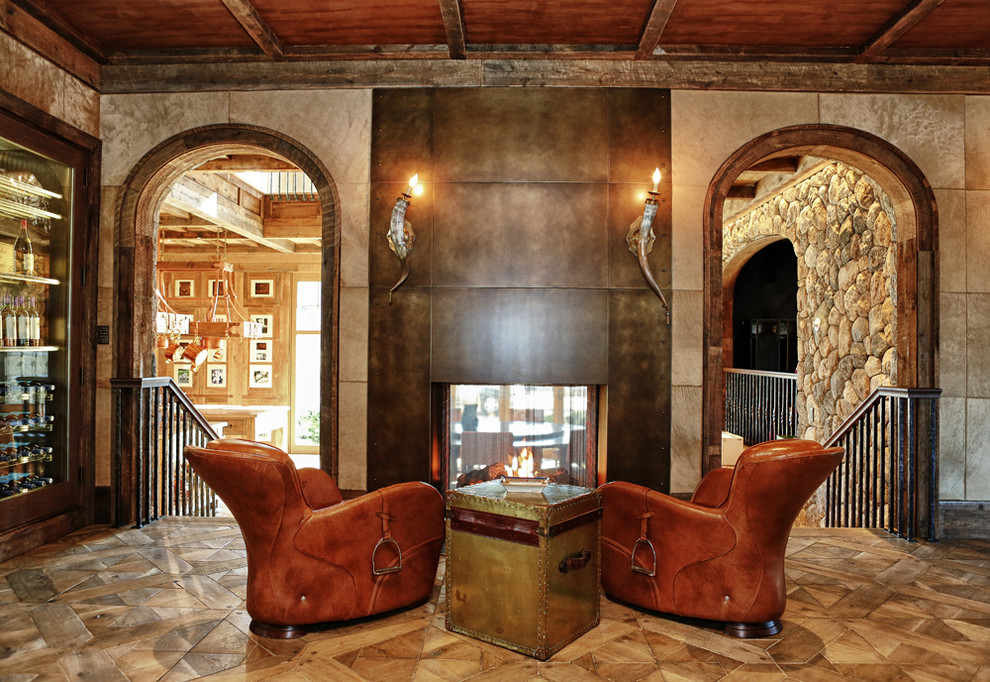 Пример оригинального дизайна: изолированная гостиная комната в стиле рустика с домашним баром и двусторонним камином