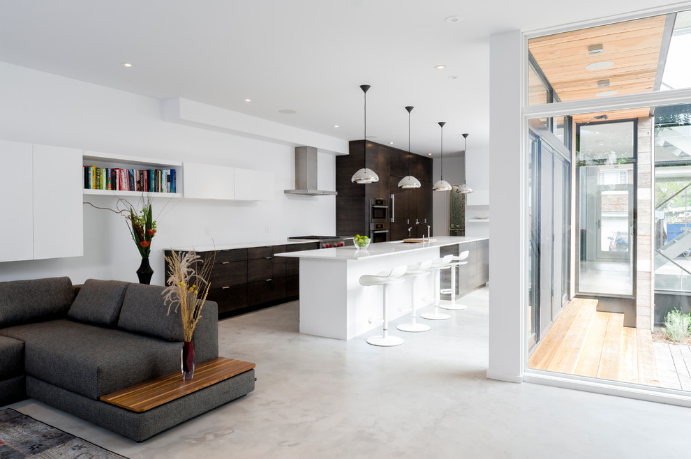 Inspiration för ett funkis vardagsrum, med betonggolv och vitt golv