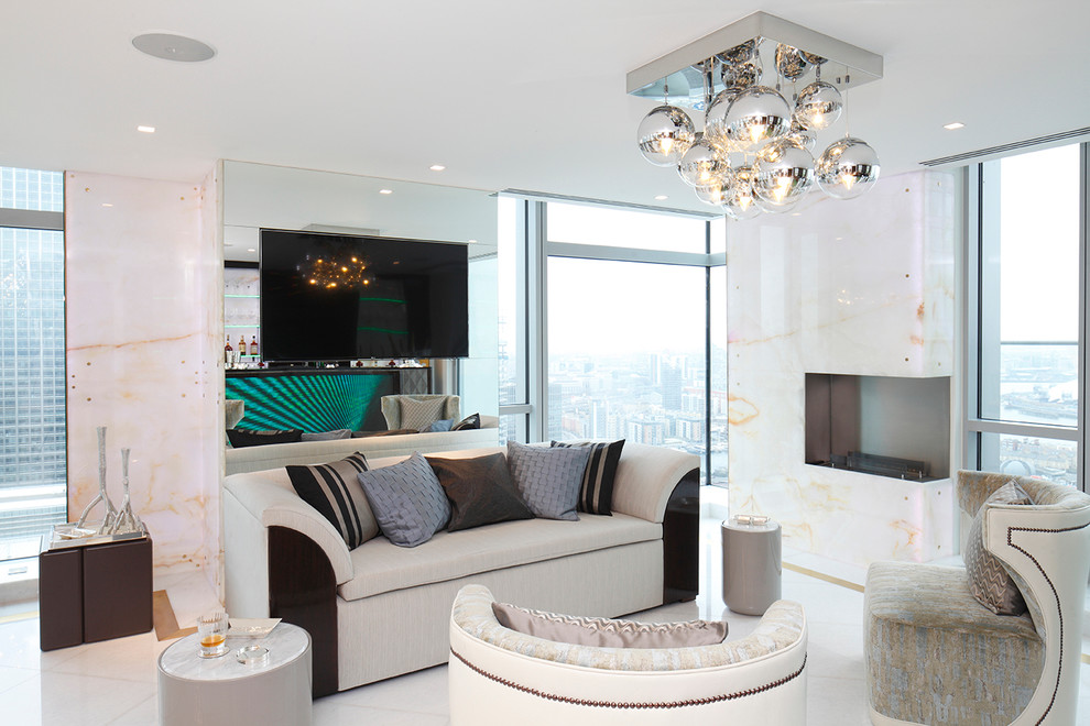 Contemporary formal living room in London with a wall mounted tv.
