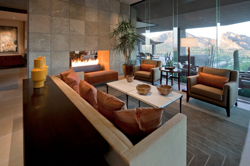 This is an example of a contemporary living room in Austin with a tiled fireplace surround.