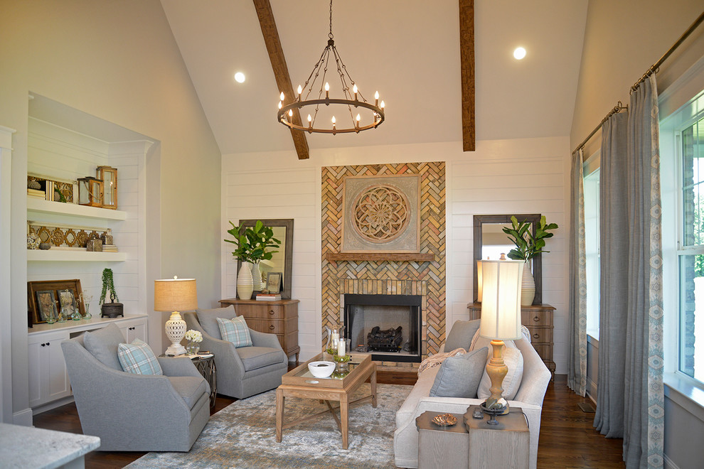 Photo of a traditional living room in Other with a standard fireplace, a brick fireplace surround, white walls, dark hardwood flooring and brown floors.