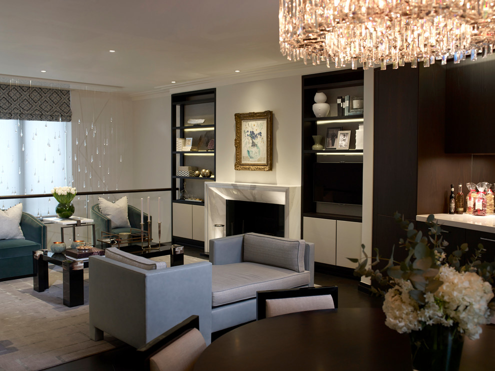 Inspiration for a medium sized contemporary formal open plan living room in London with grey walls, dark hardwood flooring, a standard fireplace, a stone fireplace surround, a concealed tv and brown floors.