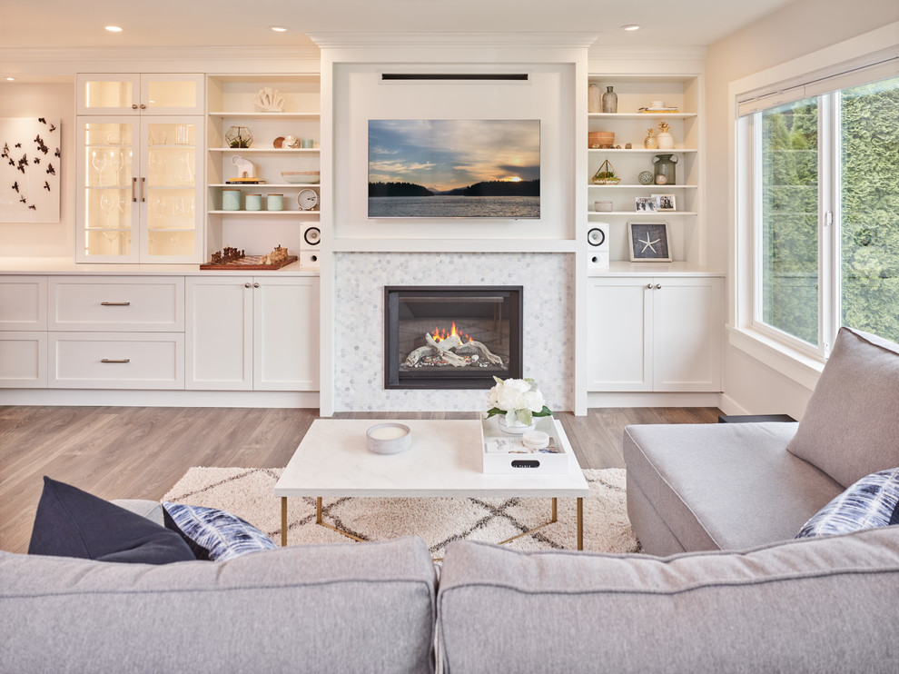 Inspiration for a medium sized modern formal open plan living room in Other with white walls, medium hardwood flooring, a standard fireplace, a tiled fireplace surround, a wall mounted tv and brown floors.