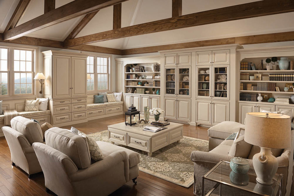Living room library - large traditional open concept medium tone wood floor and brown floor living room library idea in Jacksonville with white walls, no fireplace and no tv