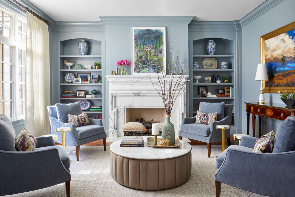 Inspiration for a medium sized classic formal open plan living room in Denver with blue walls, medium hardwood flooring, a standard fireplace, a stone fireplace surround, no tv and brown floors.