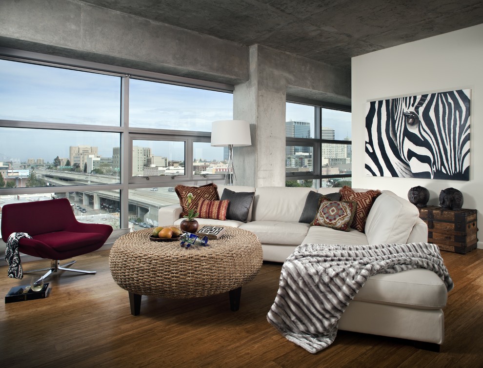 Living room - industrial medium tone wood floor living room idea in San Francisco