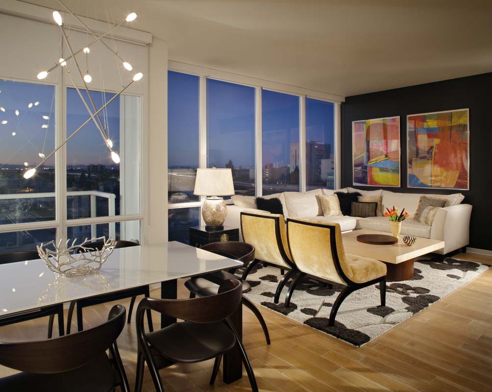Example of a minimalist open concept living room design in San Francisco with black walls