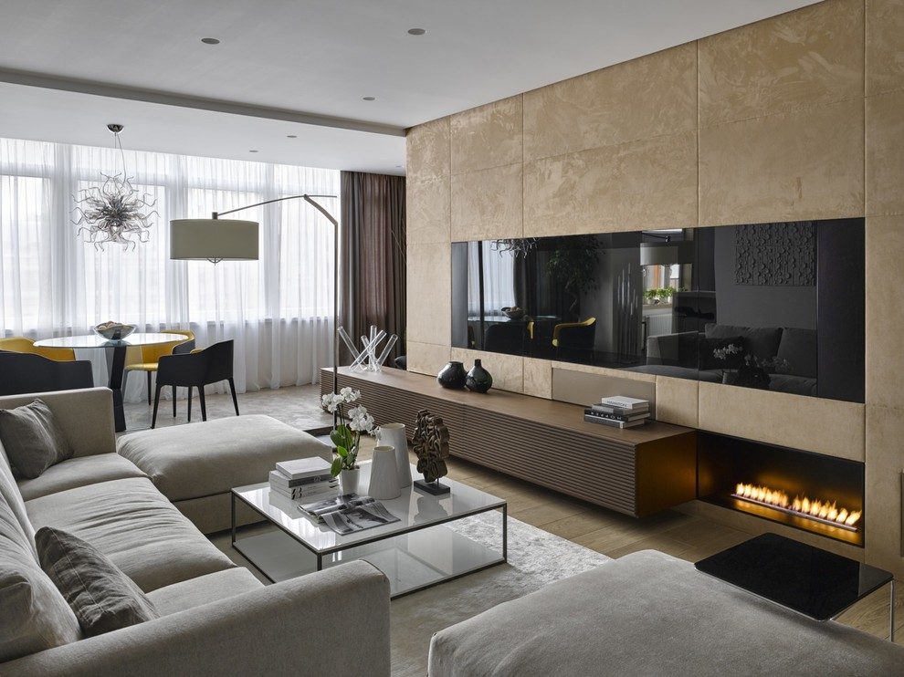 Inspiration for a mid-sized contemporary formal and open concept living room remodel in Moscow with a media wall, beige walls and a ribbon fireplace