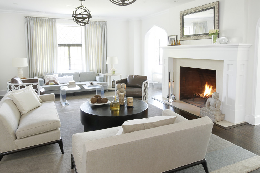 Trendy living room photo in New York with white walls and a standard fireplace