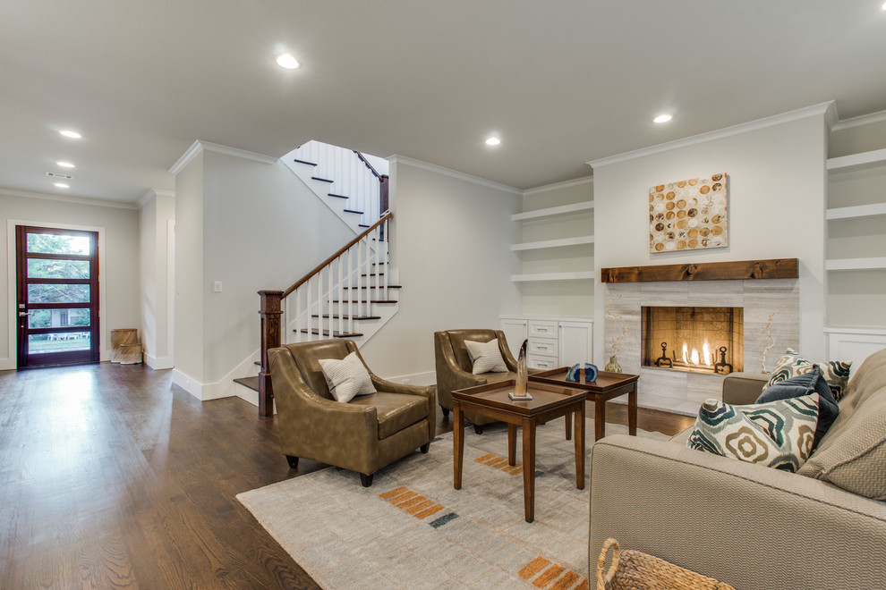 This is an example of a medium sized traditional formal open plan living room in Dallas with beige walls, a standard fireplace, no tv, dark hardwood flooring and a tiled fireplace surround.