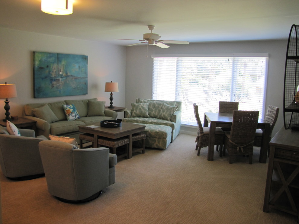 Photo of a medium sized nautical enclosed living room in Charleston with beige walls, carpet and a freestanding tv.