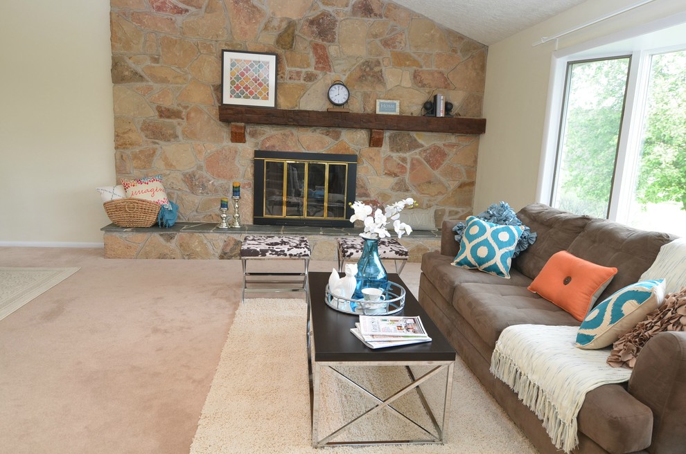 Medium sized traditional formal open plan living room in Other with beige walls, carpet, a standard fireplace, a stone fireplace surround and no tv.