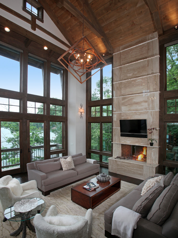Medium sized rustic formal open plan living room in Atlanta with white walls, dark hardwood flooring, a standard fireplace, a stone fireplace surround and a wall mounted tv.