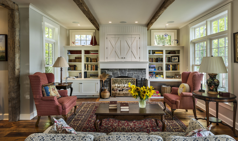 Living room - farmhouse living room idea in New York with a standard fireplace, a stone fireplace and gray walls