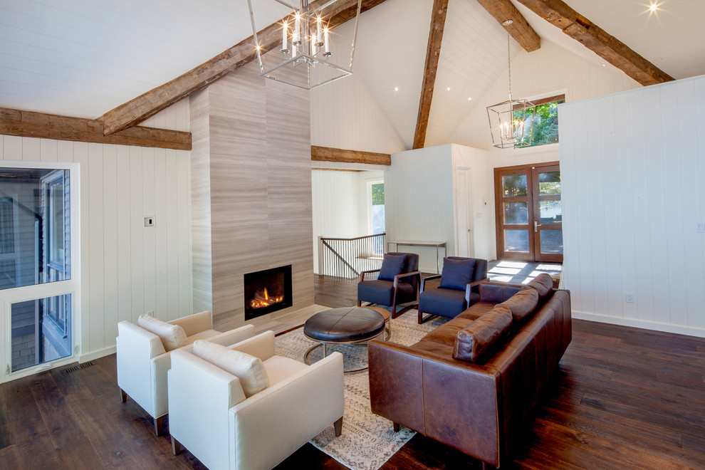 Example of a mid-sized trendy open concept dark wood floor living room design in Toronto with white walls, a standard fireplace, a stone fireplace and no tv
