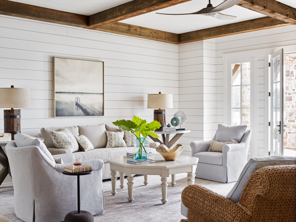 Living room - transitional exposed beam living room idea in Atlanta with white walls