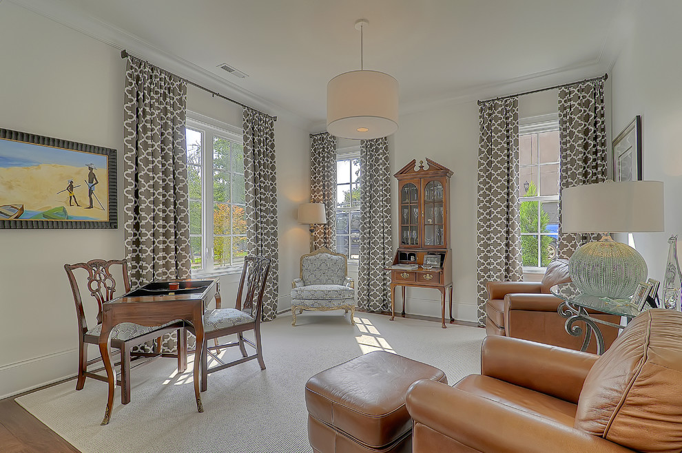 Example of a transitional living room design in Charlotte