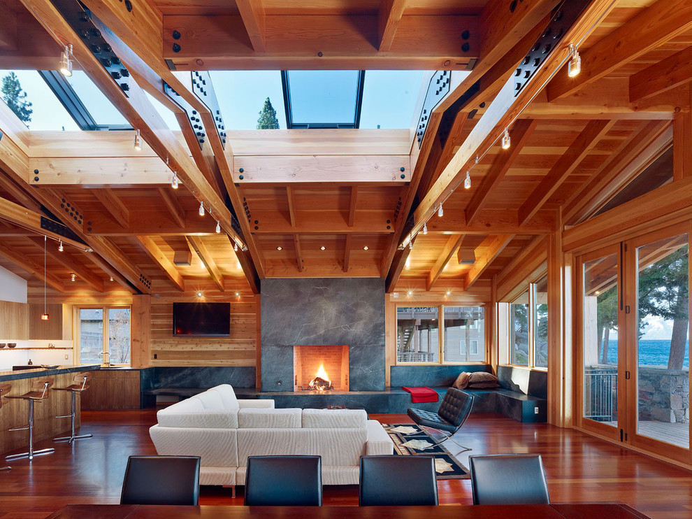 Contemporary living room in San Francisco with a stone fireplace surround.