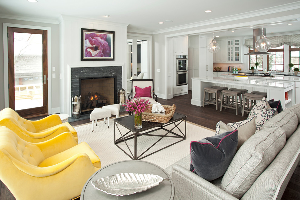 Photo of a medium sized classic formal open plan living room in Minneapolis with white walls, dark hardwood flooring, a standard fireplace, a tiled fireplace surround and no tv.